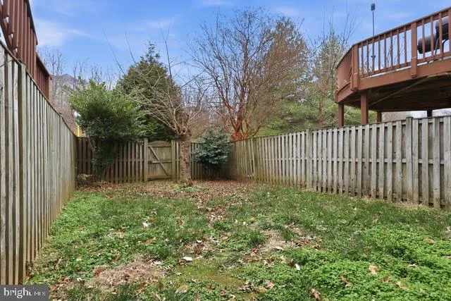 a view of backyard with green space