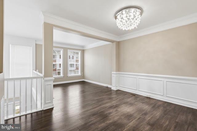 15683 Avocet Loop Woodbridge, VA 22191 - Photo 8 of 38 wooden floor in an empty room with a window