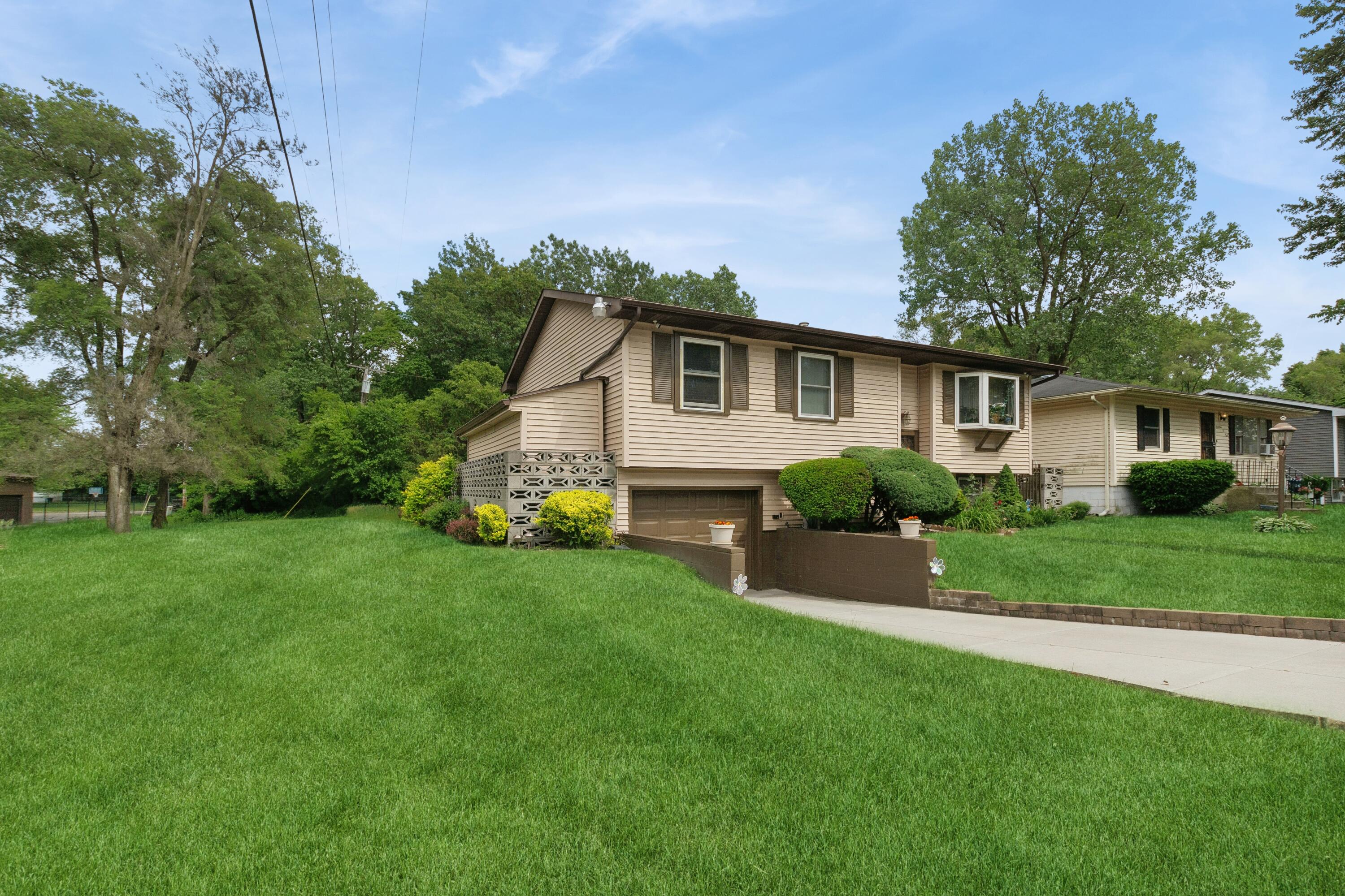 1701-1707 Mount Street Gary, IN 46404 - Photo 2 of 18 a front view of house with yard and green space