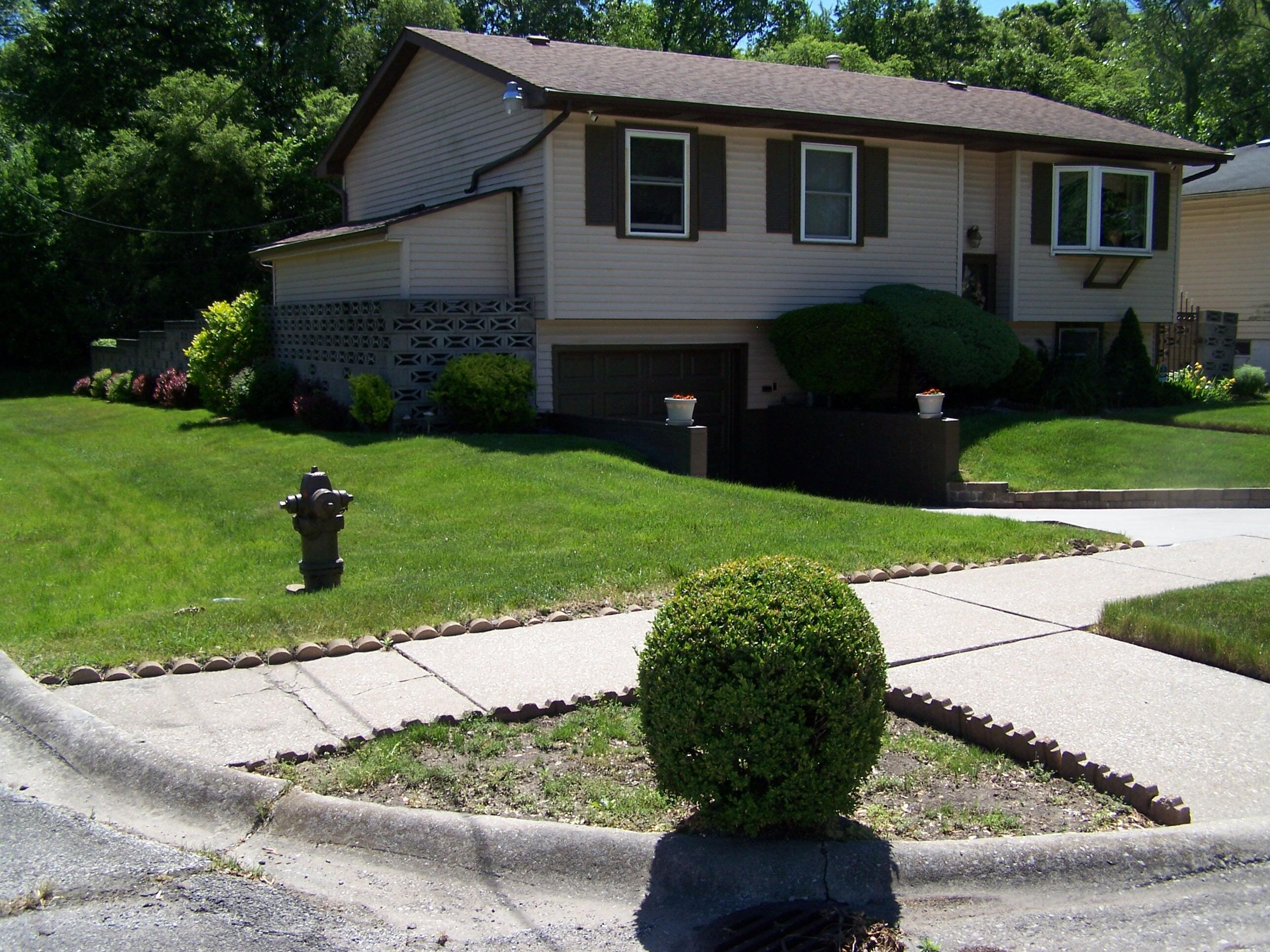 1701-1707 Mount Street Gary, IN 46404 - Photo 4 of 18 a front view of a house with a yard