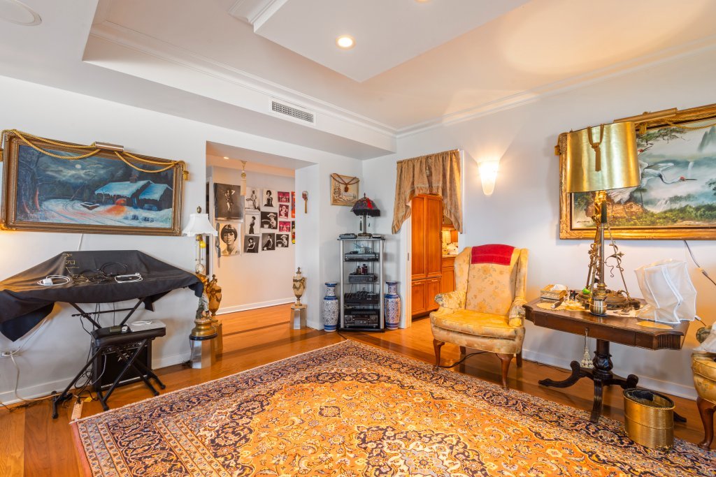 1000 North Lake Shore Plaza, Unit 13A Chicago, IL 60611 - Photo 13 of 30 a living room with furniture and a fireplace