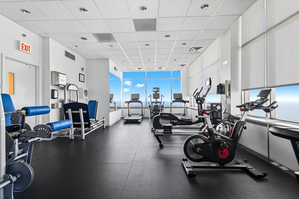 1000 North Lake Shore Plaza, Unit 13A Chicago, IL 60611 - Photo 27 of 30 a view of a room with gym equipment