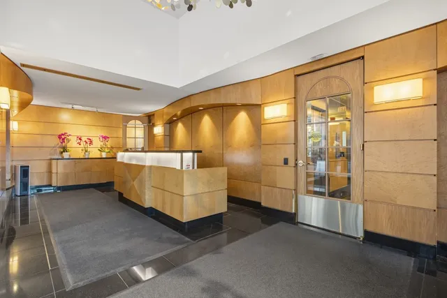 a view of a living room and a window in the room