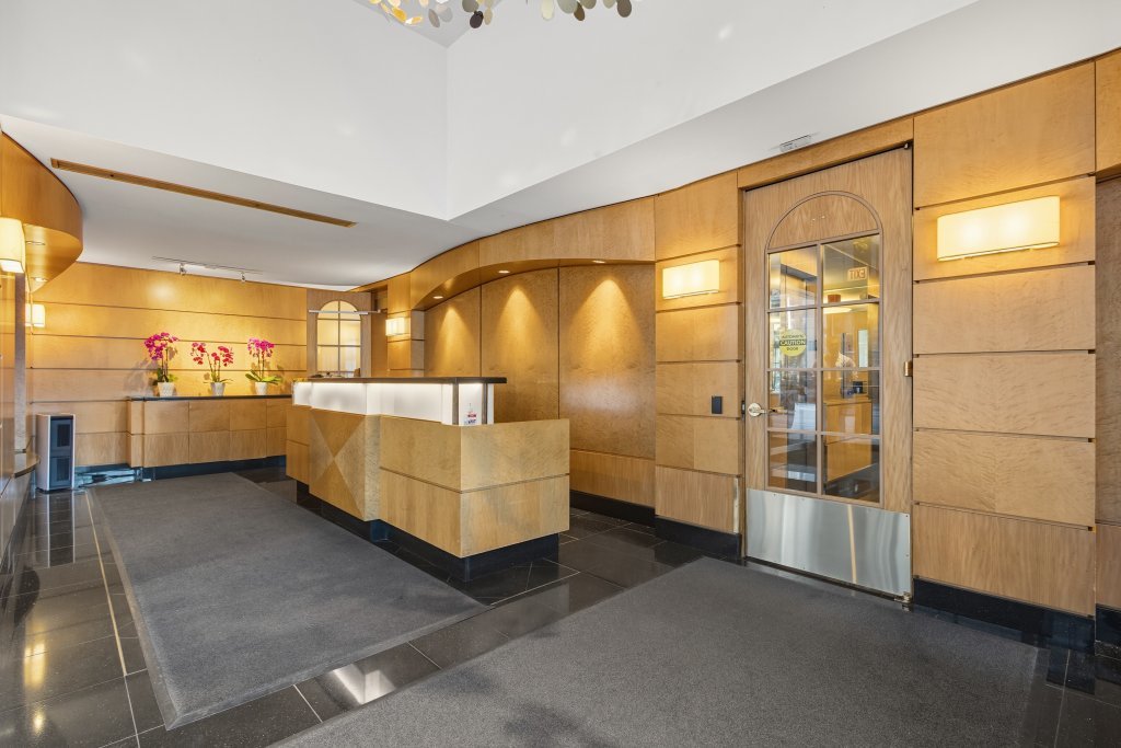 1000 North Lake Shore Plaza, Unit 13A Chicago, IL 60611 - Photo 4 of 30 a view of a living room and a window in the room