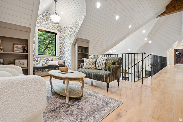 1141 South Oak Leaf Lane Springville, UT 84663 - Photo 82 of 147 ADU. UPSTAIRS. over GARAGE. Loft area featuring vaulted ceilings with shiplap, recessed lighting, and a prominent window