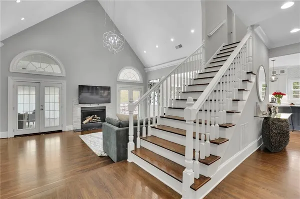 a view of entryway with livingroom and wooden floor