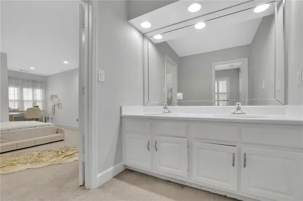a view of a bathroom with a shower curtain