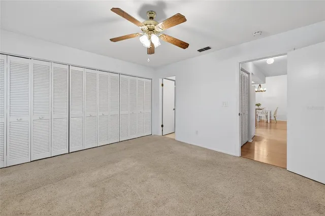 a view of a house with a yard and garage