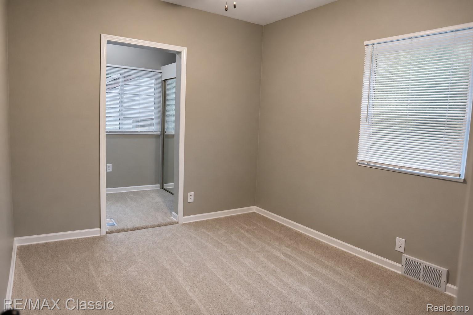 320 South Rochester Road Clawson, MI 48017 - Photo 18 of 44 Primary bedroom with double closest and half bath