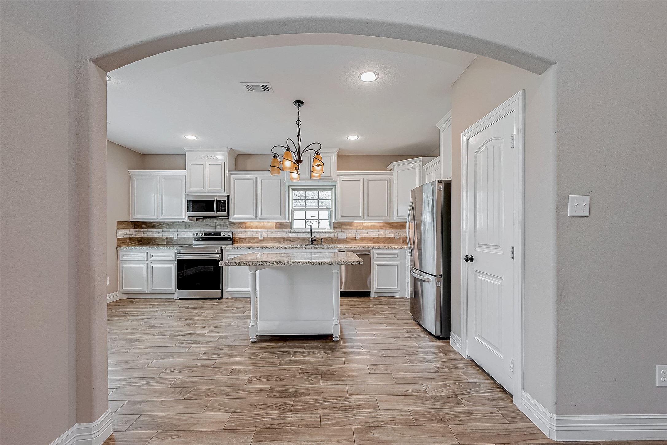 11 Bluebonnet Trinity, TX 75862 - Photo 11 of 46 a kitchen with a sink stainless steel appliances and cabinets