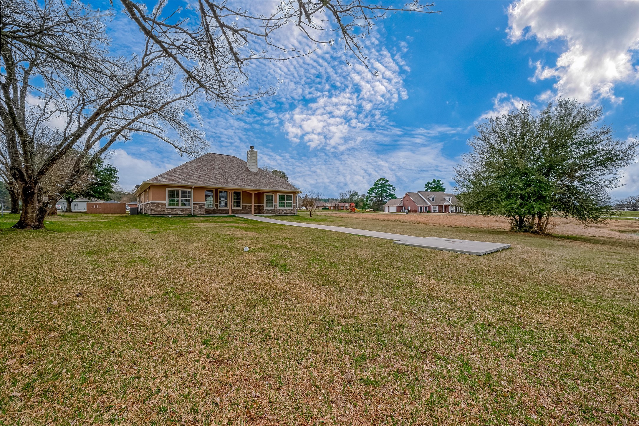 11 Bluebonnet Trinity, TX 75862 - Photo 36 of 46 a view of a yard with an umbrella
