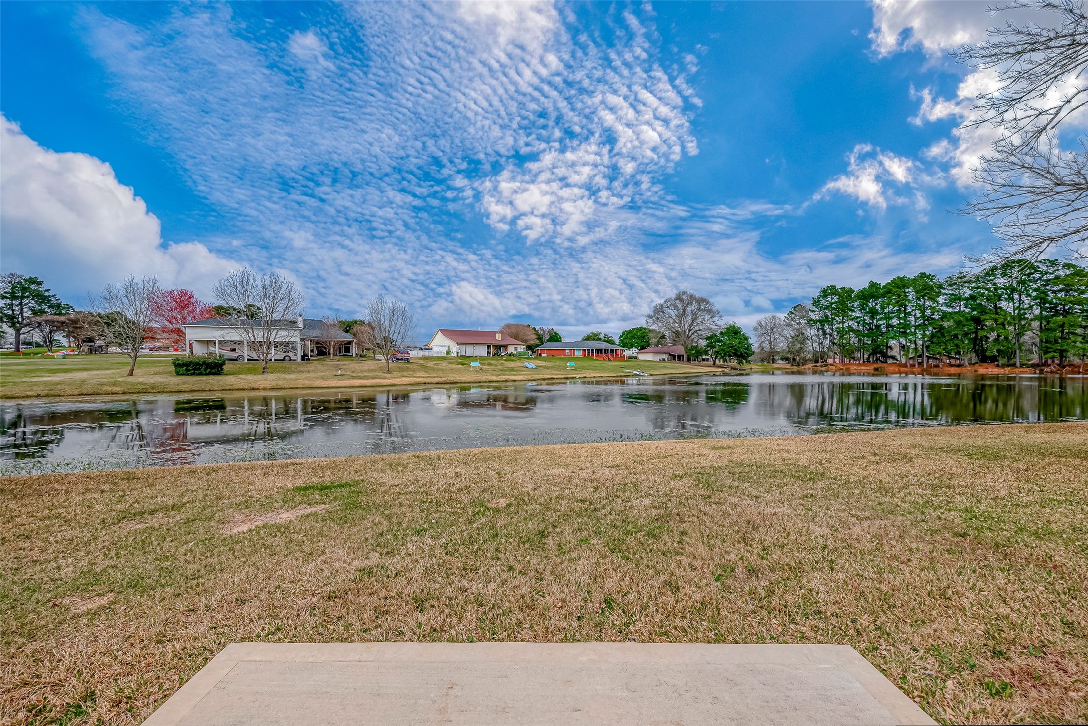 11 Bluebonnet Trinity, TX 75862 - Photo 4 of 46 a view of a lake with houses in the back