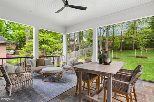 a kitchen with stainless steel appliances granite countertop a stove a sink and a wooden floors