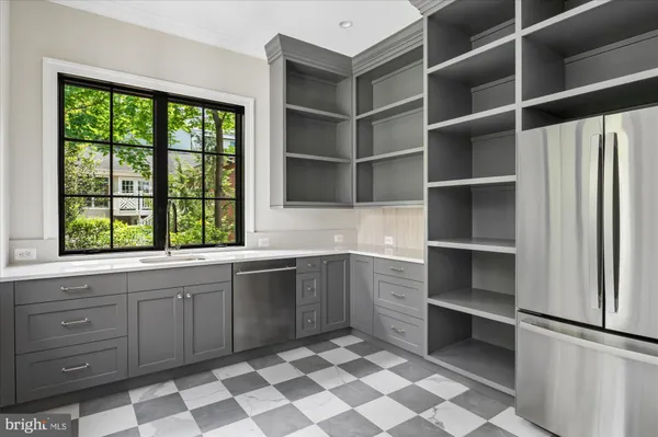 a bathroom with a sink double vanity and a mirror