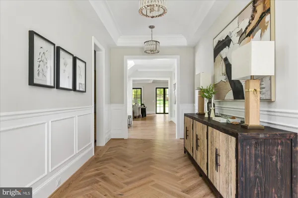a bedroom with furniture and wooden floor