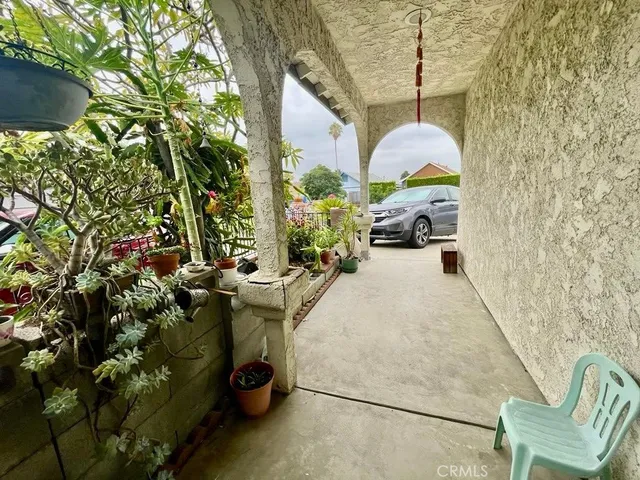 a view of balcony with furniture