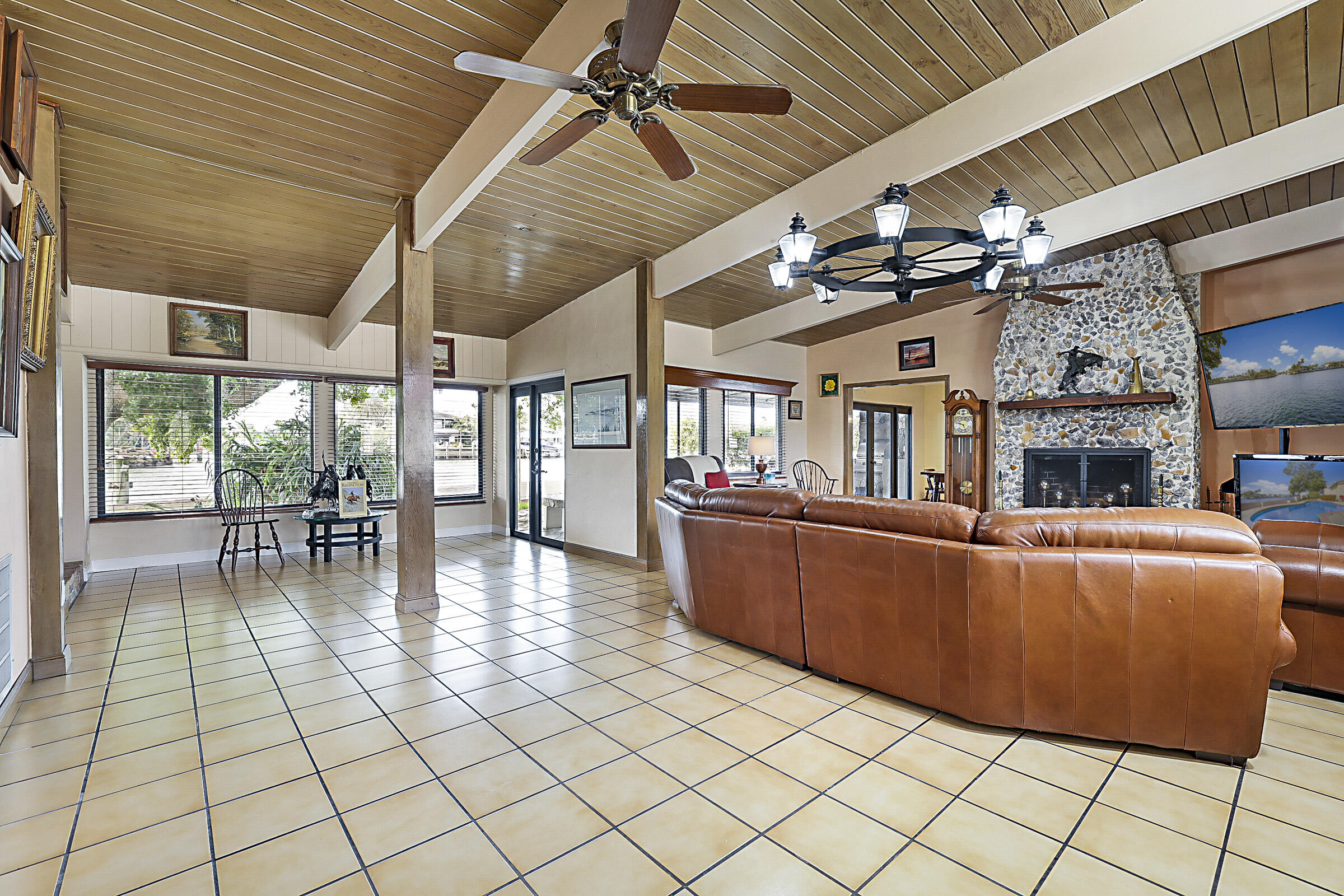 1901 North Riverside Drive Pompano Beach, FL 33062 - Photo 15 of 45 a living room with furniture and a fireplace