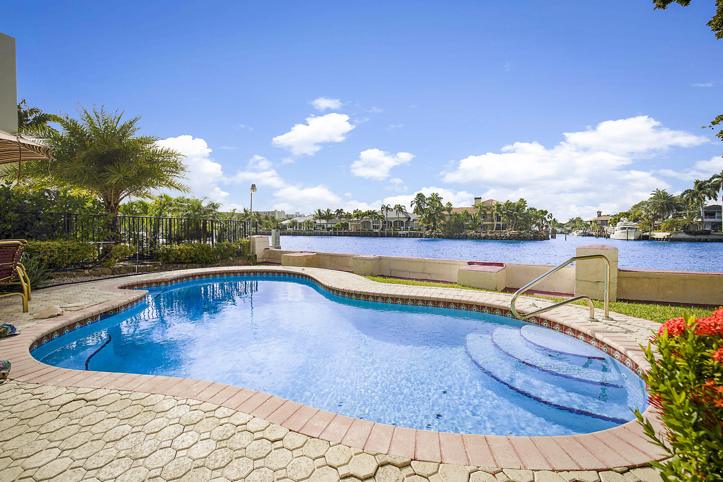 1901 North Riverside Drive Pompano Beach, FL 33062 - Photo 39 of 45 a view of a swimming pool and an outdoor seating