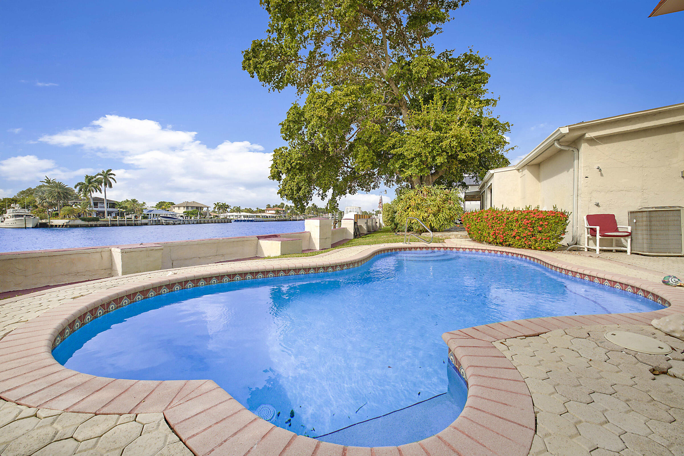 1901 North Riverside Drive Pompano Beach, FL 33062 - Photo 4 of 45 a view of a swimming pool with an ocean view