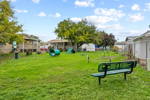 a view of a park with benches