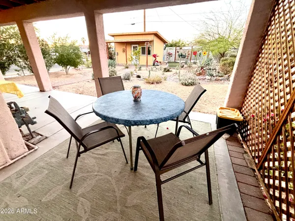 a view of a outdoor seating area with furniture