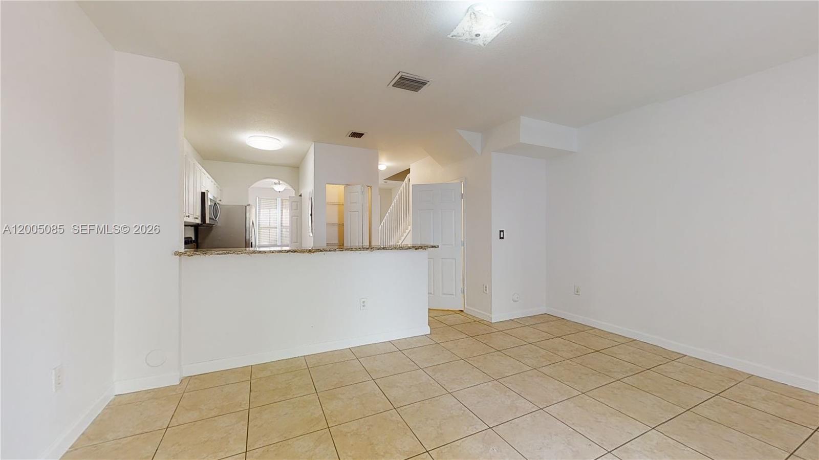 2929 Southeast 2nd Street, Unit 7 Homestead, FL 33033 - Photo 11 of 24 a view of a kitchen with marble kitchen