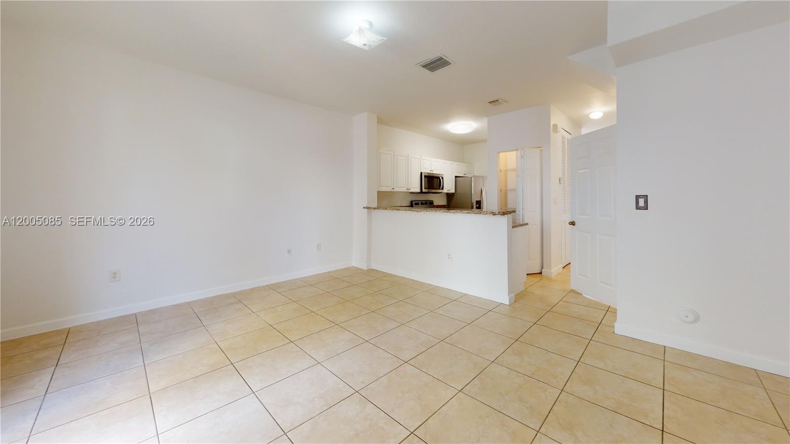 2929 Southeast 2nd Street, Unit 7 Homestead, FL 33033 - Photo 12 of 24 a view of a kitchen with a sink