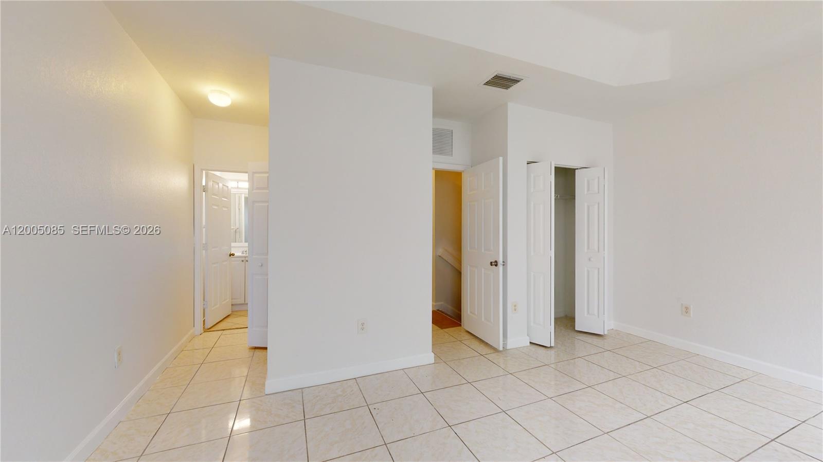 2929 Southeast 2nd Street, Unit 7 Homestead, FL 33033 - Photo 16 of 24 a view of an empty room with window