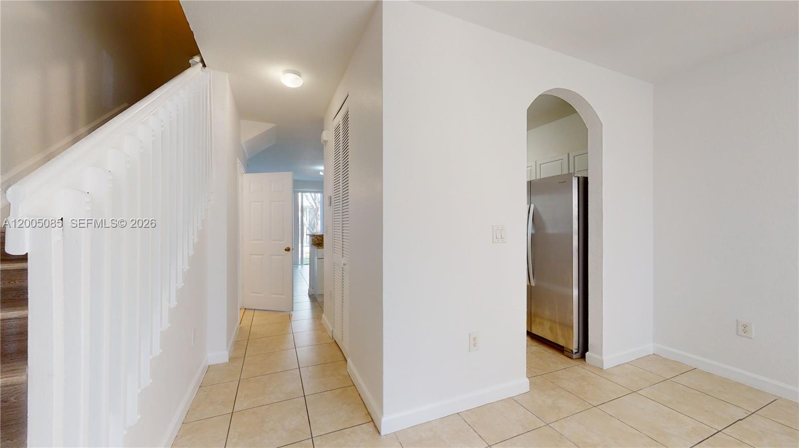2929 Southeast 2nd Street, Unit 7 Homestead, FL 33033 - Photo 2 of 24 a view of a hallway with closet and a bathroom