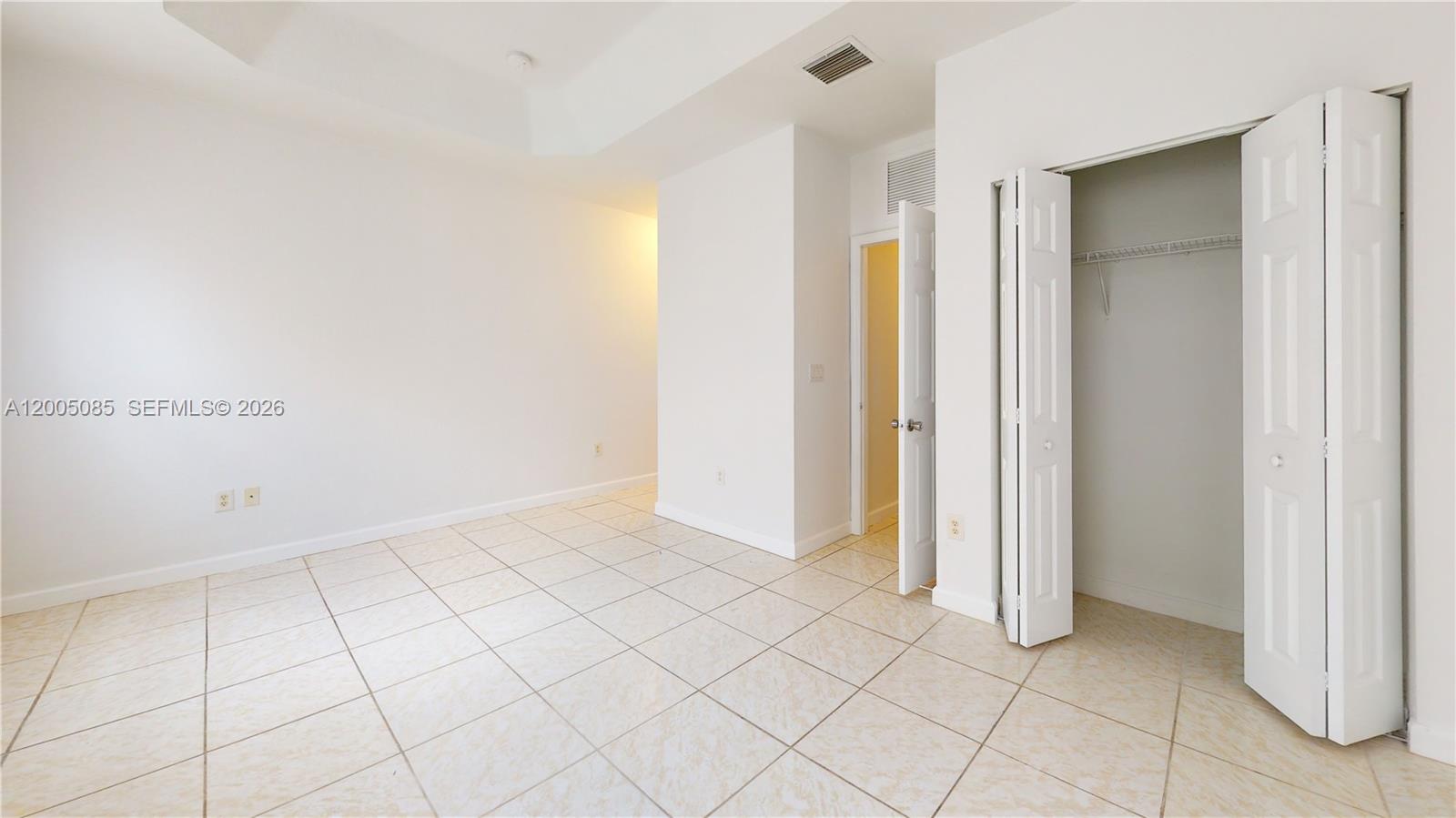 2929 Southeast 2nd Street, Unit 7 Homestead, FL 33033 - Photo 24 of 24 an empty room with white walls