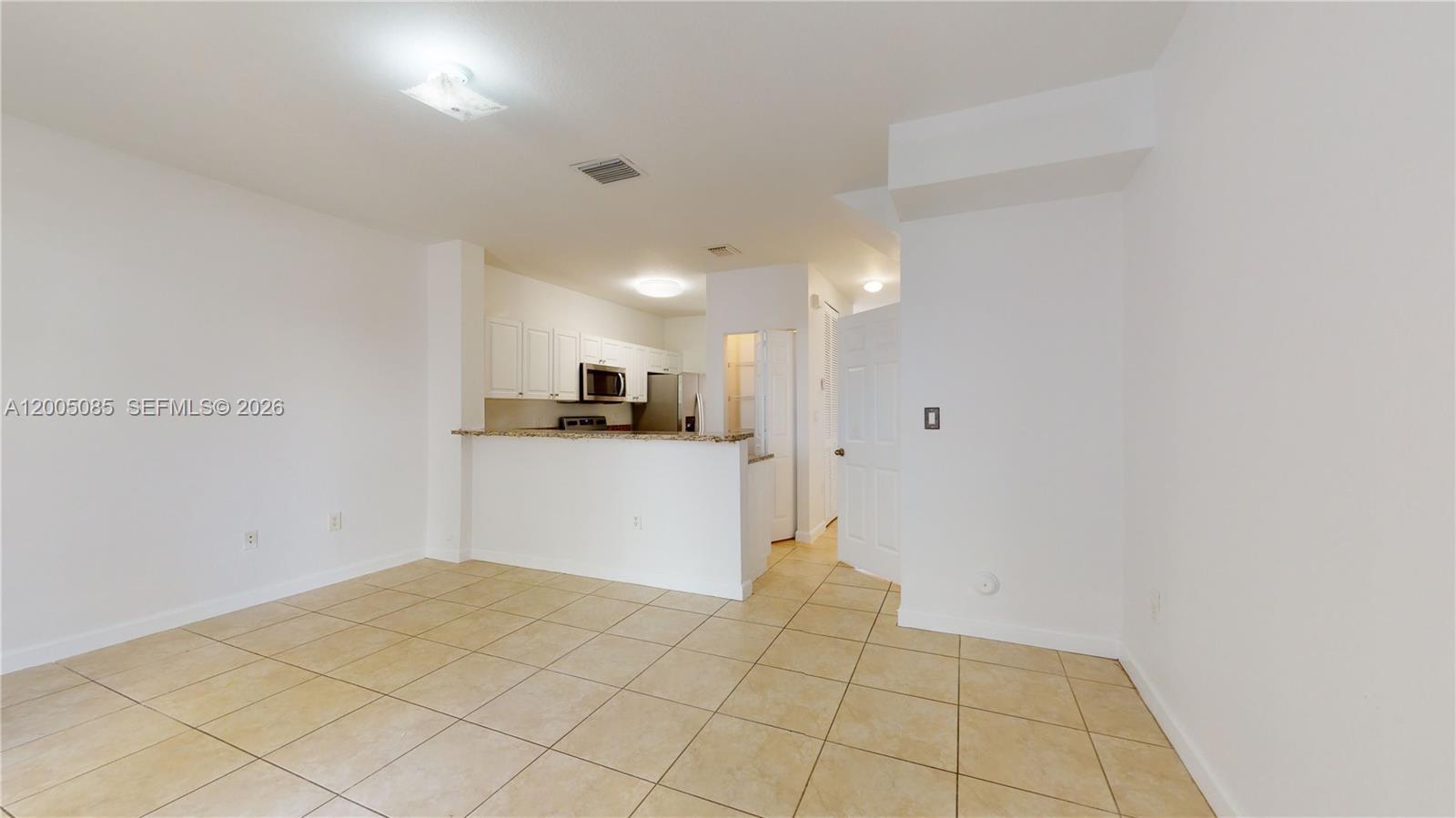 2929 Southeast 2nd Street, Unit 7 Homestead, FL 33033 - Photo 8 of 24 a view of a kitchen with a sink
