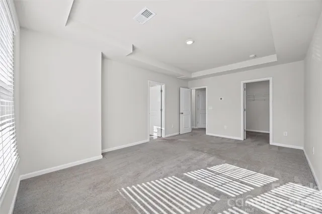 a bathroom with a sink double vanity and a shower