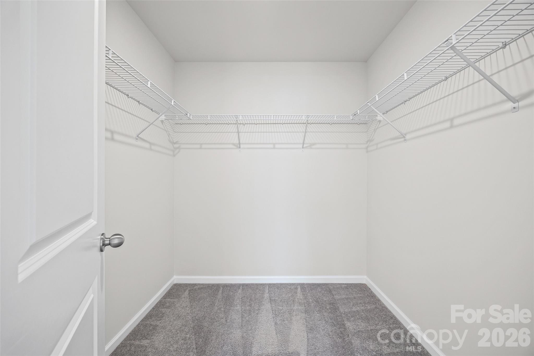 612 Rustic Path Lane Fort Mill, SC 29708 - Photo 19 of 38 a view of a room with racks on the wall