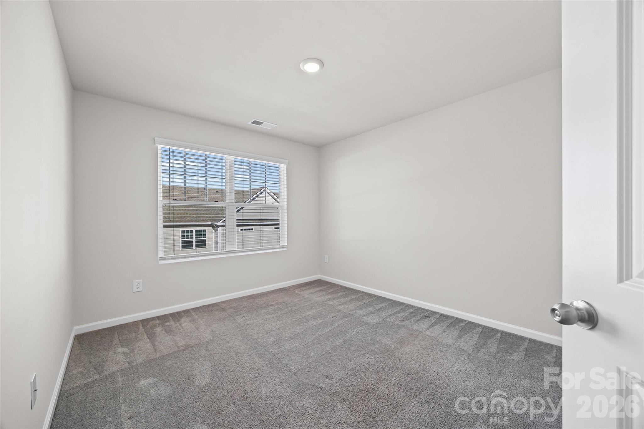 612 Rustic Path Lane Fort Mill, SC 29708 - Photo 22 of 38 an empty room with windows