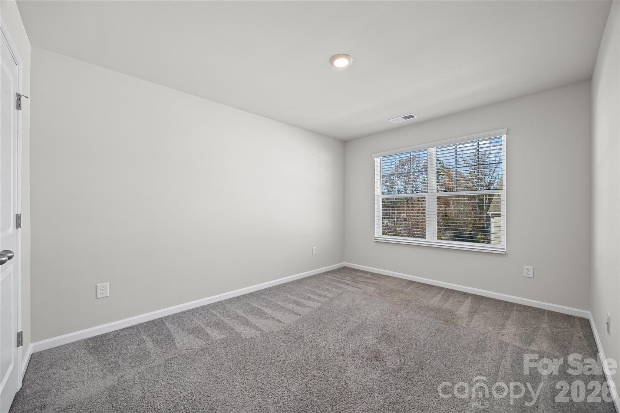 612 Rustic Path Lane Fort Mill, SC 29708 - Photo 24 of 38 an empty room with a window