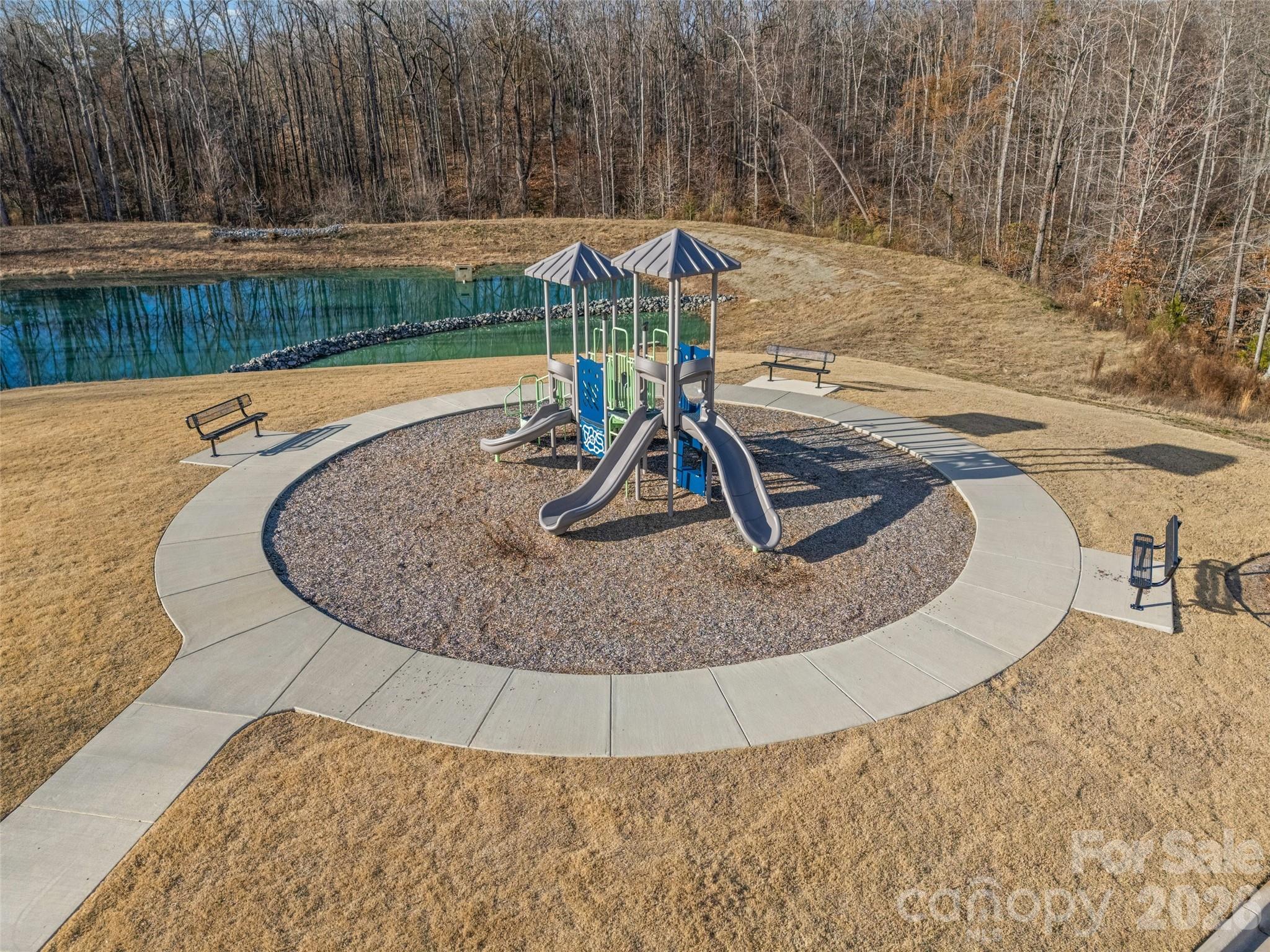 612 Rustic Path Lane Fort Mill, SC 29708 - Photo 36 of 38 a view of a swimming pool with a yard