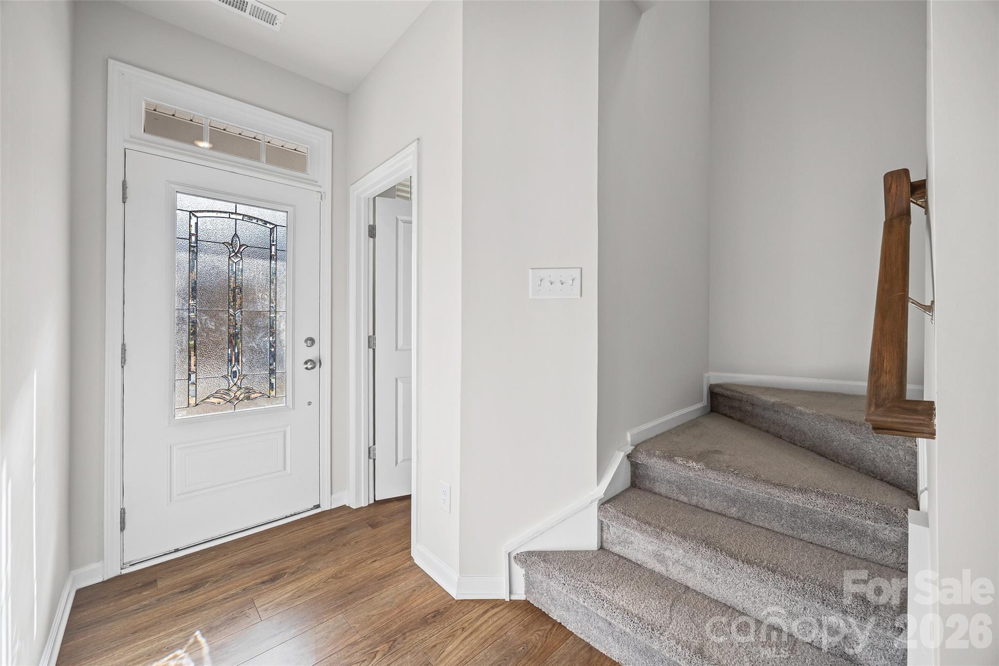 612 Rustic Path Lane Fort Mill, SC 29708 - Photo 6 of 38 a view of entryway and hall with wooden floor