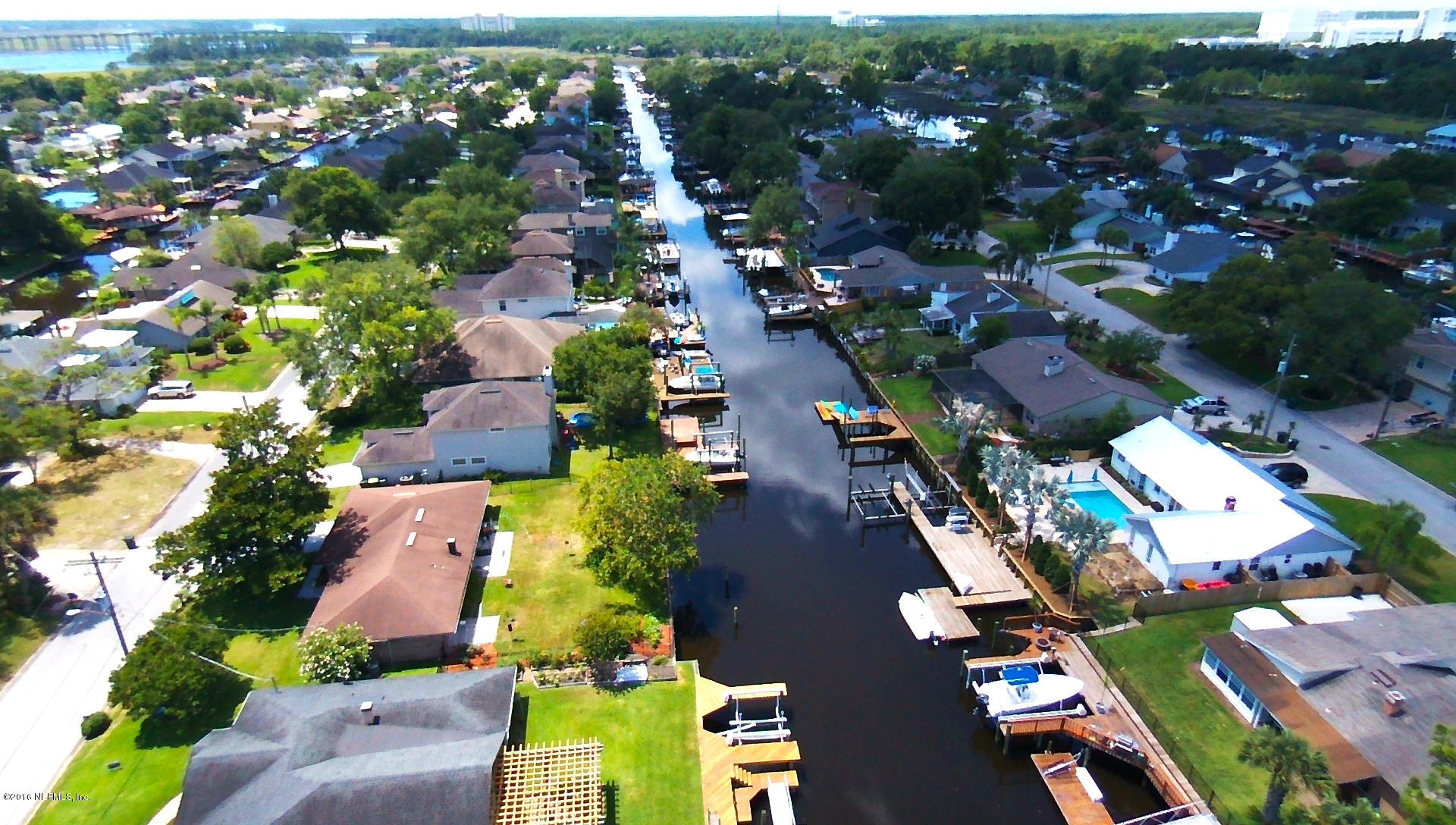 14446 Stacey Road Jacksonville, FL 32250 - Photo 30 of 31 an aerial view of residential houses with outdoor space