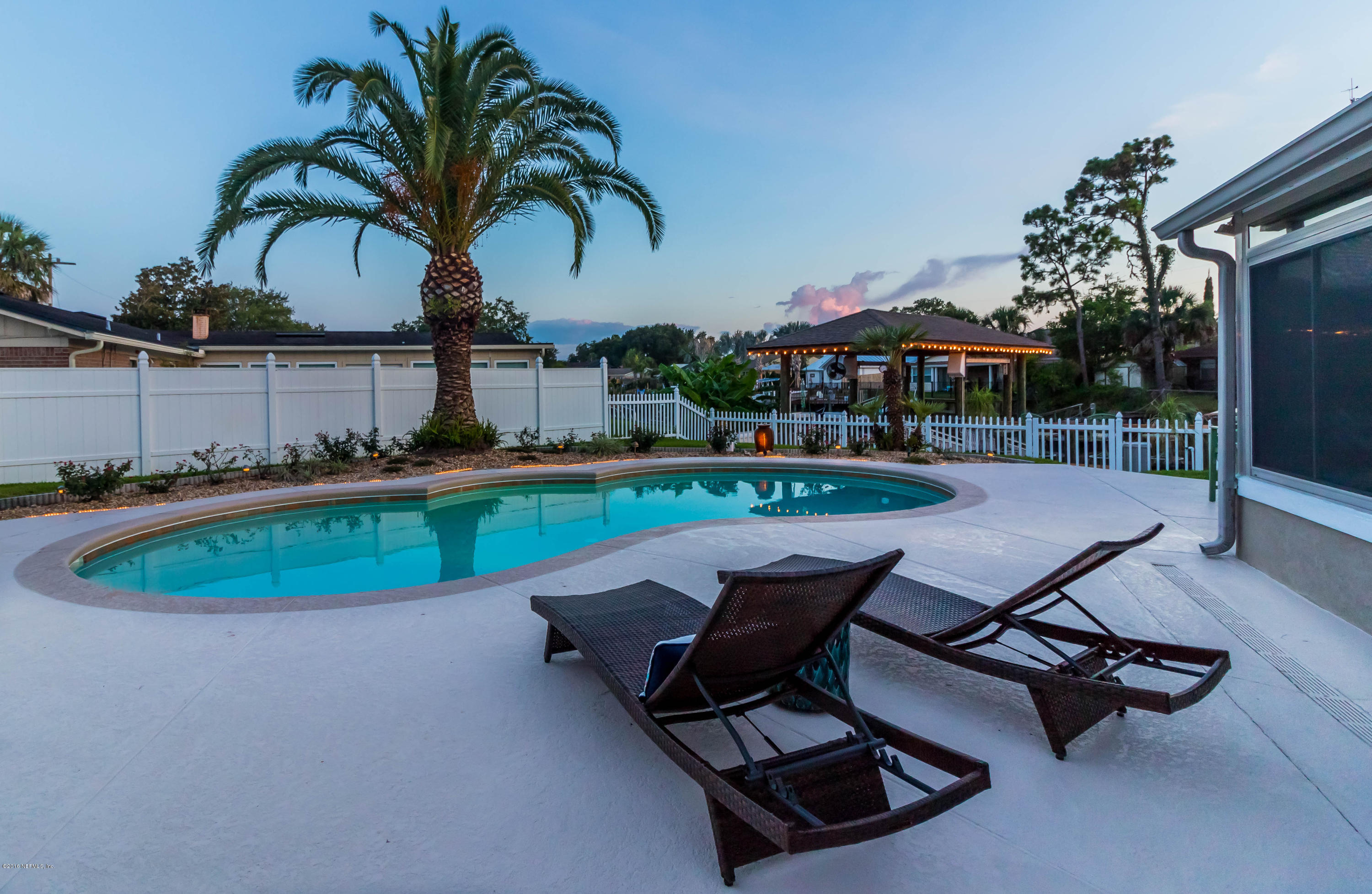 14446 Stacey Road Jacksonville, FL 32250 - Photo 31 of 31 a swimming pool with outdoor seating yard and barbeque oven