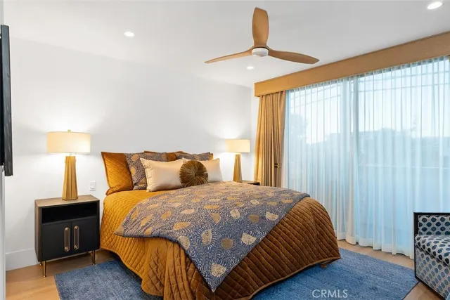 a bathroom with a sink mirror and vanity