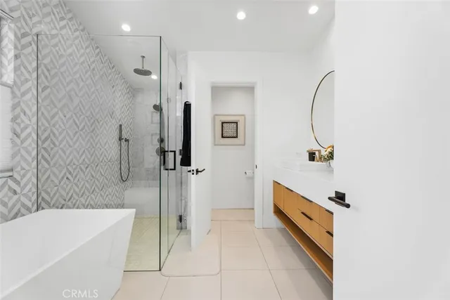 a view of a patio with couches and potted plants