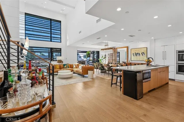 a living room with fireplace furniture and a flat screen tv
