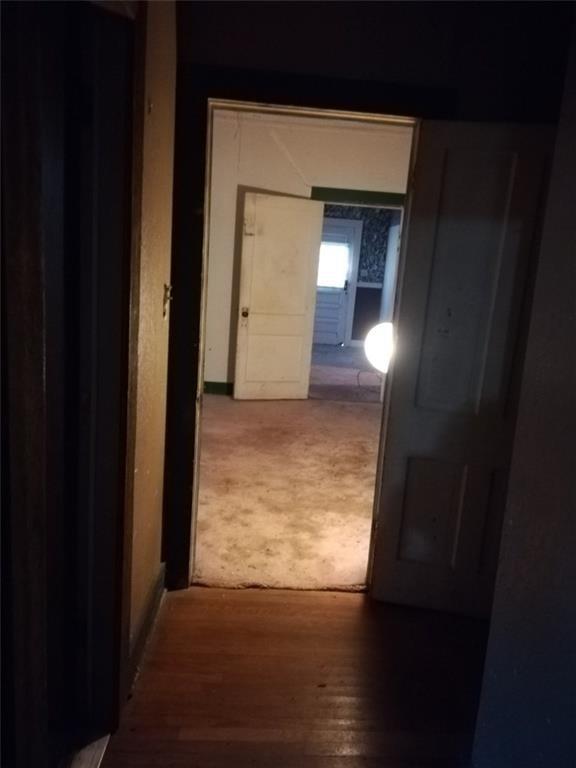 457 West Main Street Ranger, TX 76470 - Photo 2 of 9 a view of hallway with wooden floor