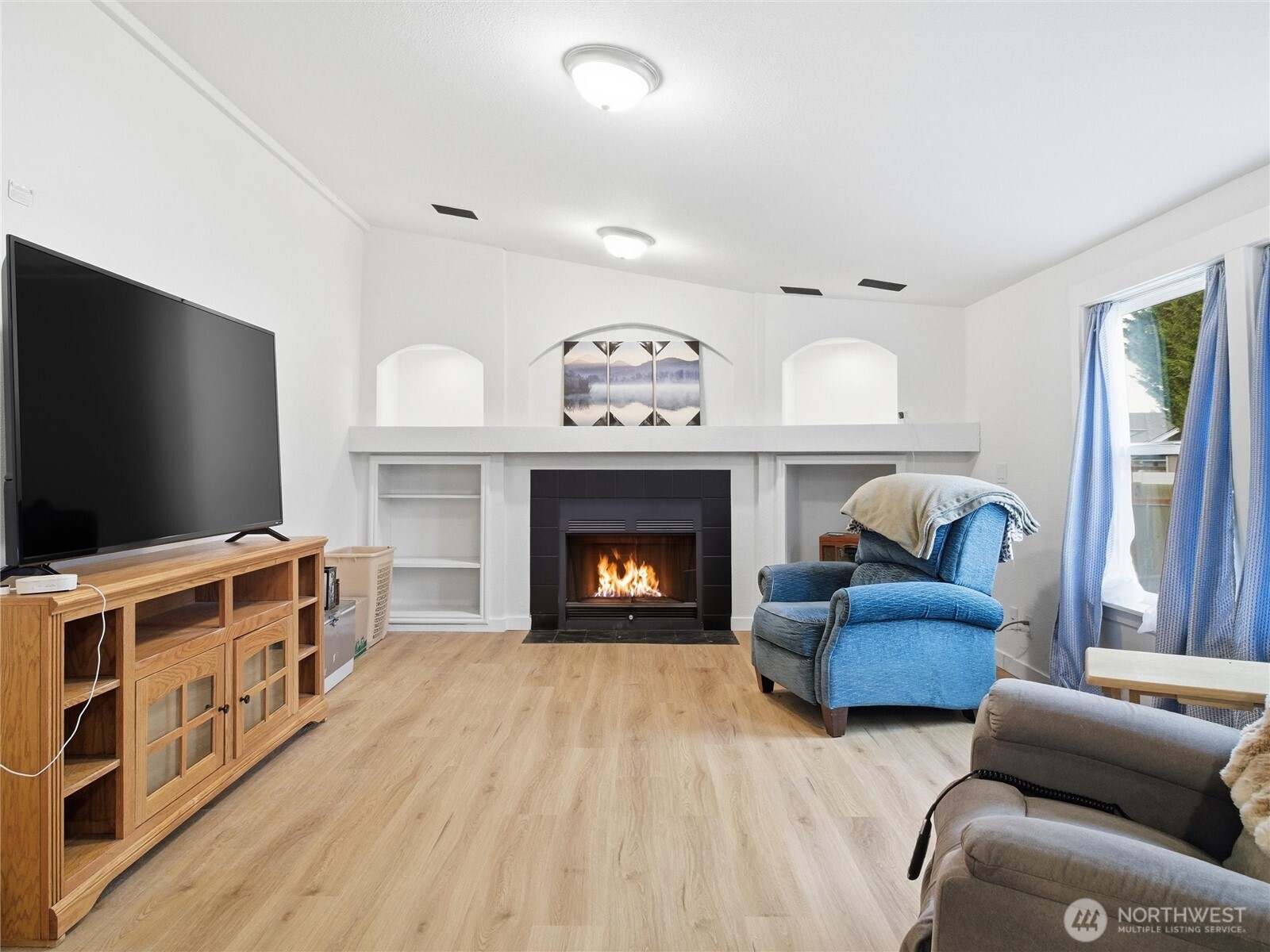 15429 107th Loop Southeast Yelm, WA 98597 - Photo 14 of 29 a living room with furniture and a flat screen tv