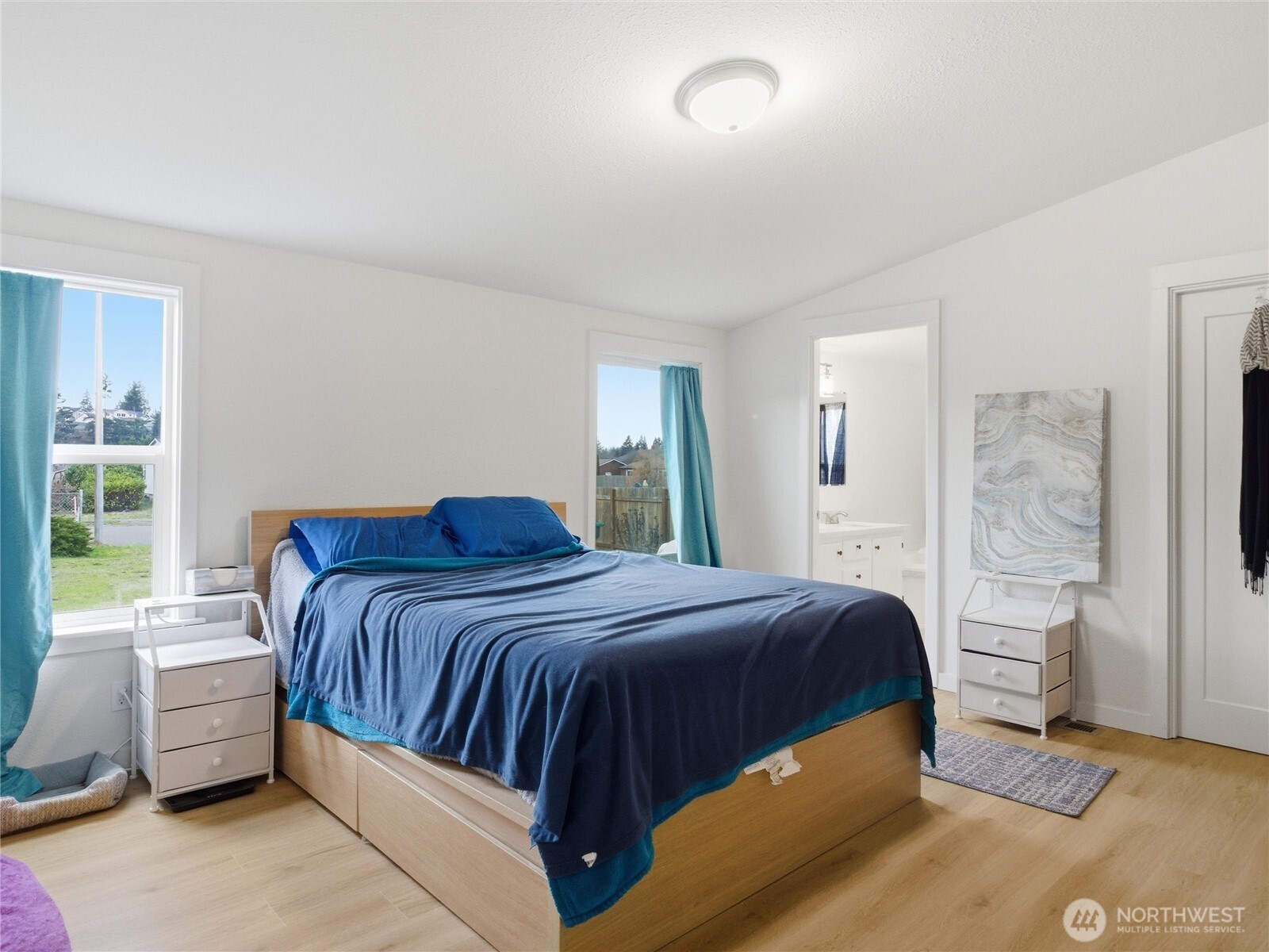 15429 107th Loop Southeast Yelm, WA 98597 - Photo 16 of 29 a bedroom with a bed and a couch