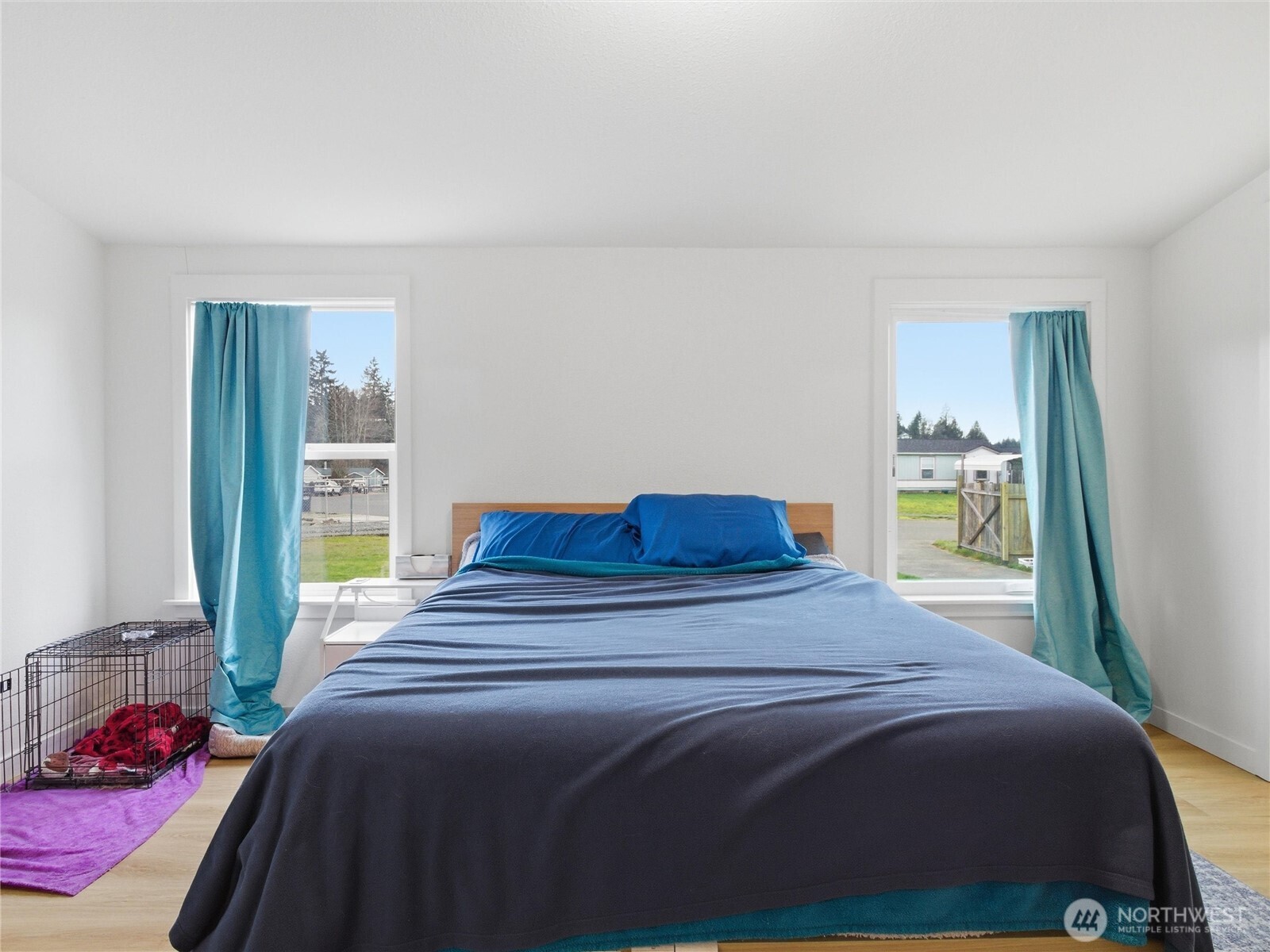 15429 107th Loop Southeast Yelm, WA 98597 - Photo 17 of 29 a bedroom with a bed and a window
