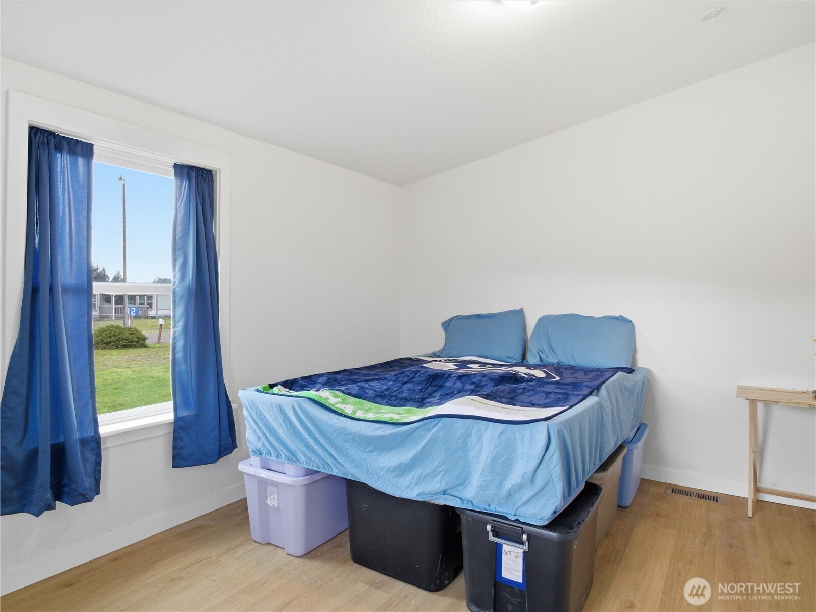 15429 107th Loop Southeast Yelm, WA 98597 - Photo 19 of 29 a dining room with furniture and wooden floor