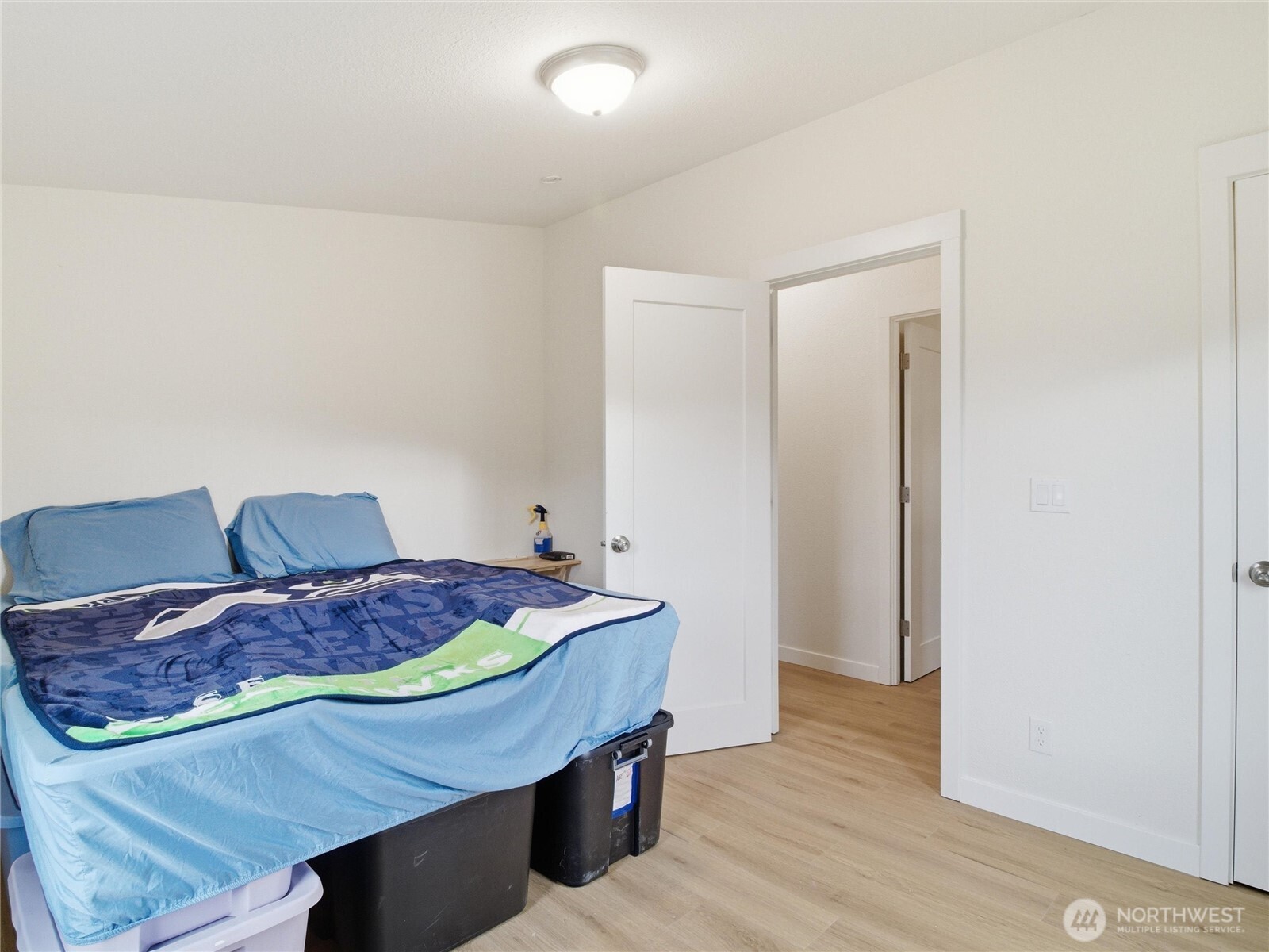 15429 107th Loop Southeast Yelm, WA 98597 - Photo 20 of 29 a bed room with furniture and wooden floor