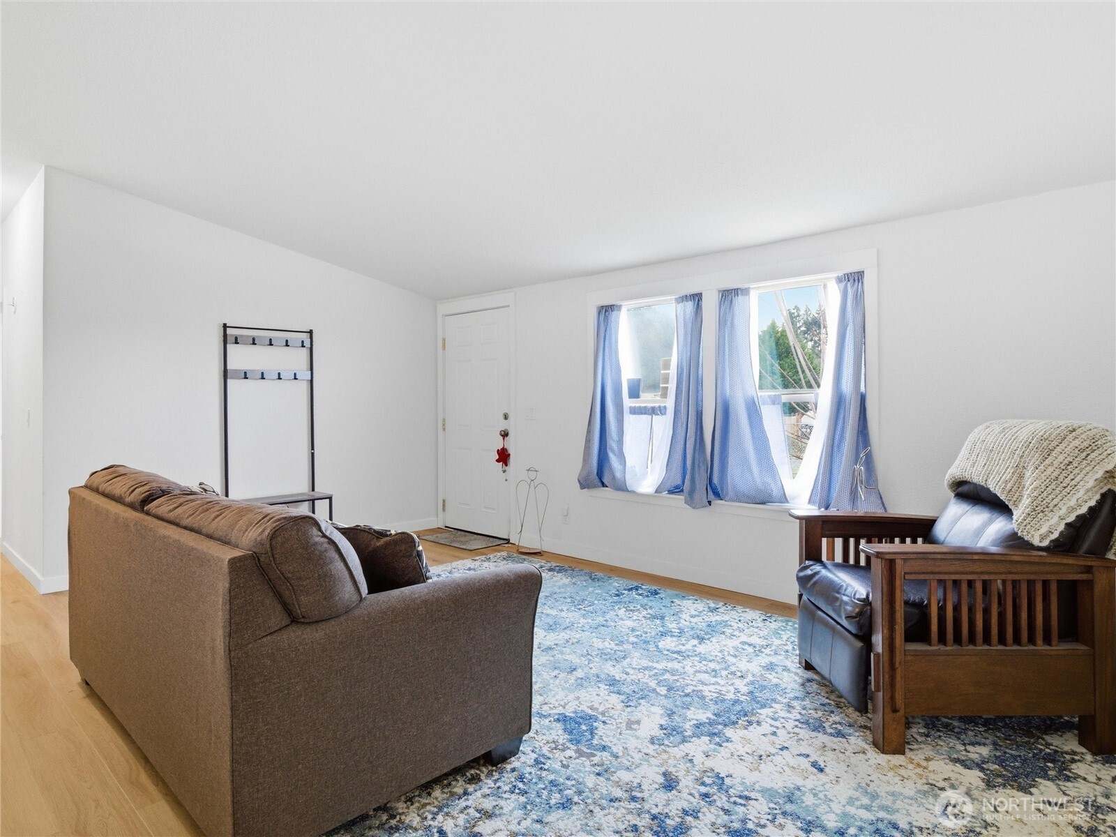 15429 107th Loop Southeast Yelm, WA 98597 - Photo 6 of 29 a living room with furniture chess board and a window