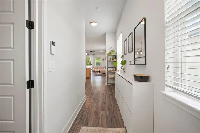 a view of a kitchen from the hallway